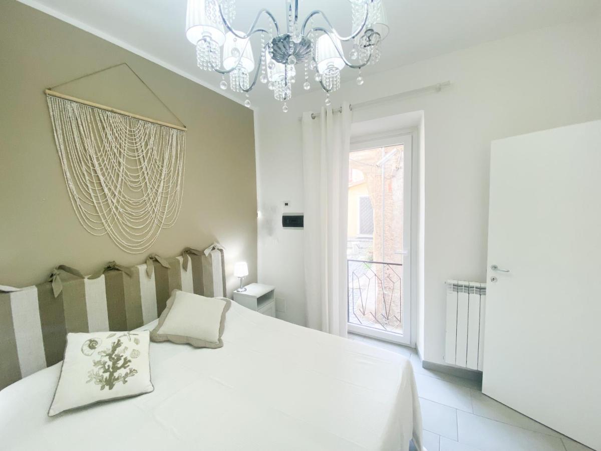 Luminoso Appartamento Sul Lago - Lake Court Ангуилара Сабация Екстериор снимка